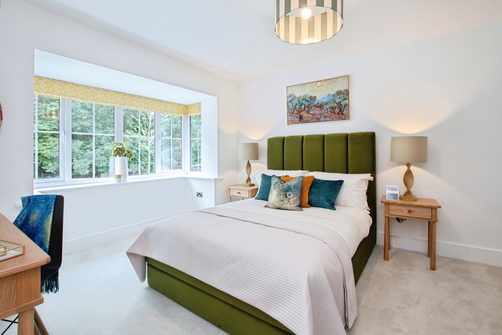bedroom with double bed and bay window in background